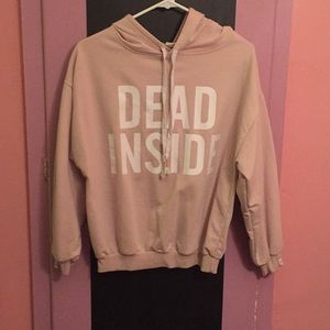 Light pink sweat shirt, says dead inside.